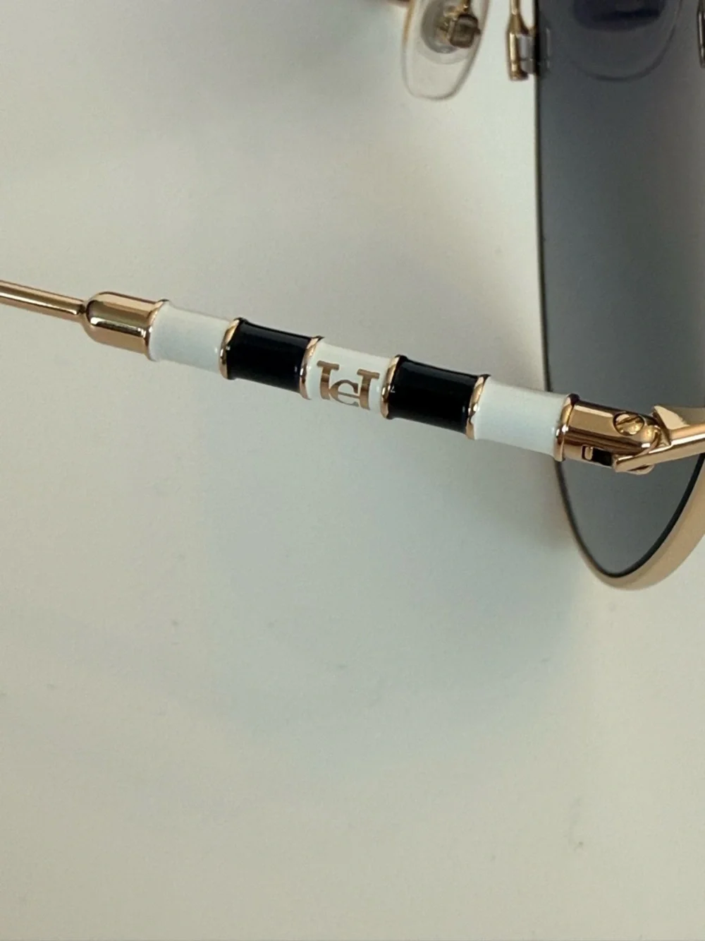 Carolina Herrera Gold Aviator Sunglasses with Dark Gray Lenses CH0034/S